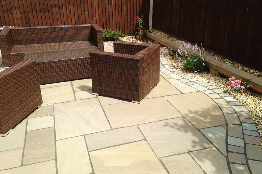 Lovely patio paved with AWBS Exclusive natural stone low cost paving slabs
